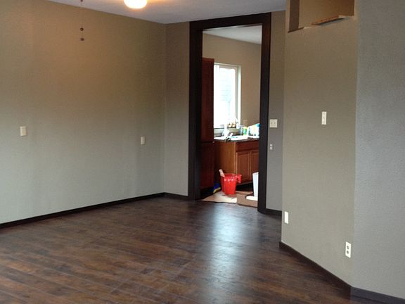 Living room, to kitchen.