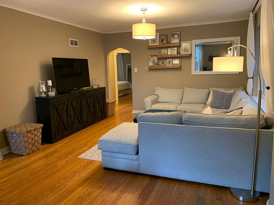 Large living area with windows and tons of natural light.