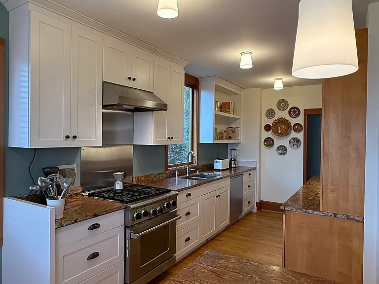 The Kitchen with plenty of cabinets.