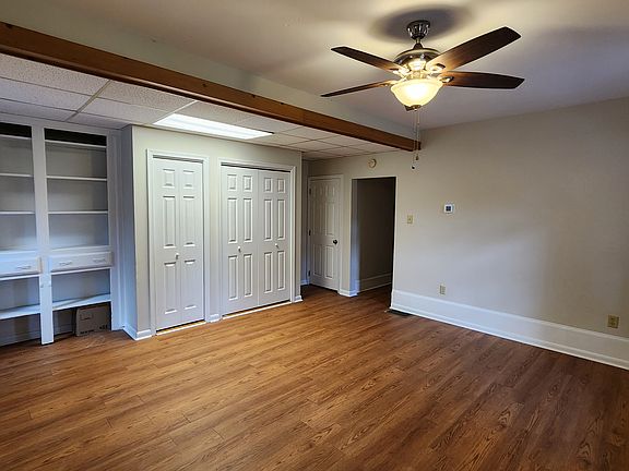 Living Room with storage and built in shelves