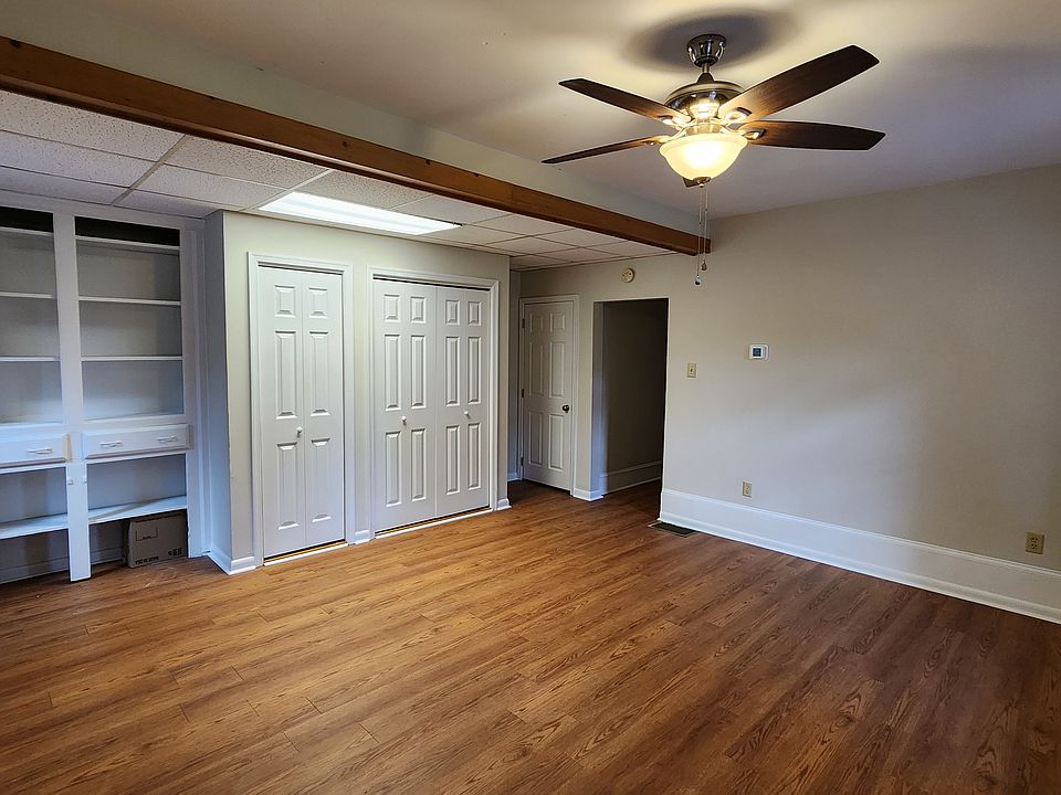 Living Room with storage and built in shelves