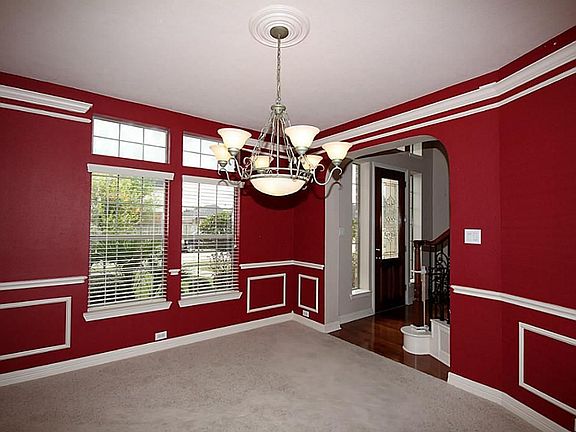 The over-sized Formal DIning is the ideal place to enjoy special meals or host fabulous dinner parties! Note: The pretty moldings, upgraded chandelier and illuminated crown molding.