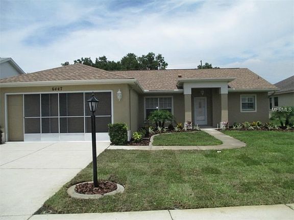 FRONT WITH NEW SOD AND LANDSCAPE