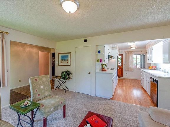 Front living room, and kitchen