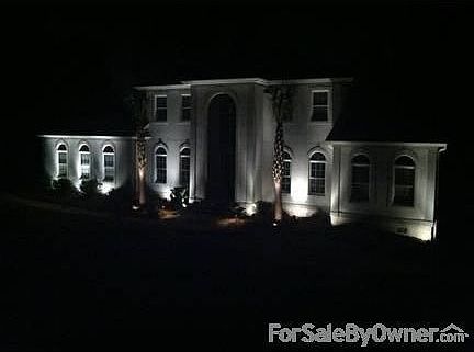 Front Yard View at Night
						:
						Landscape lighting makes this house stand out.
