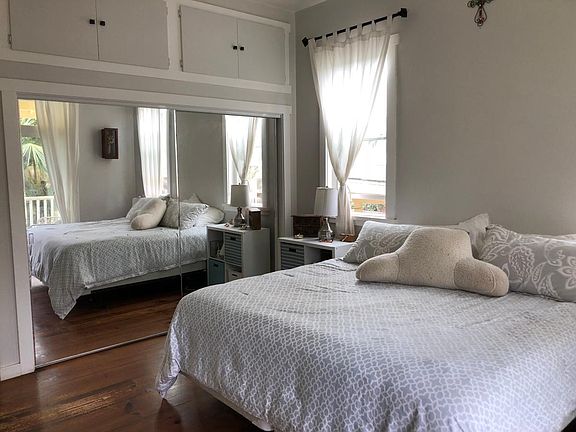 Master bedroom has a 9' closet with overhead cabinet storage