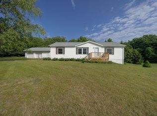 7060 Strawberry Ln, Elmira, MI 49730