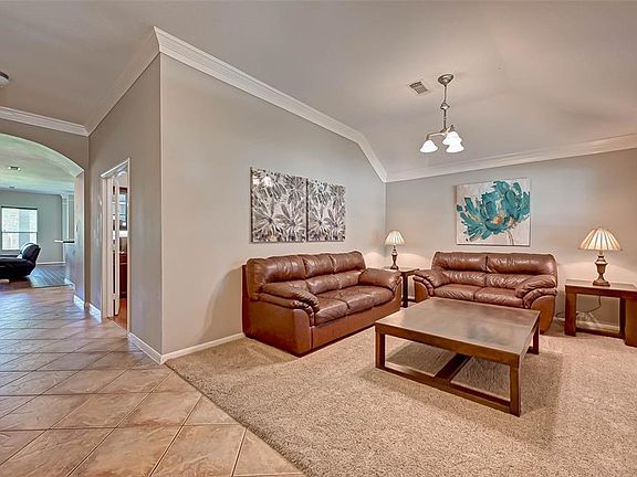 View from your foyer. Detailed crown molding accents this room.