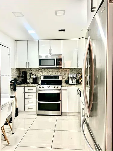 9500 W Bay Harbor Dr #2G Photo 1