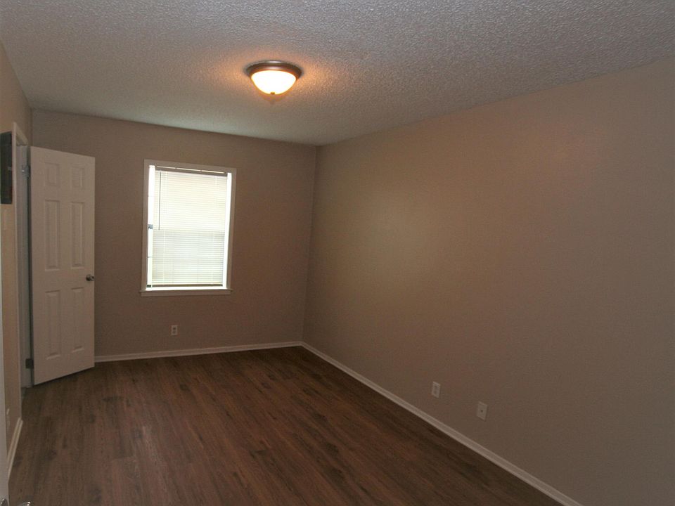 Spacious bedroom with walk-in closet