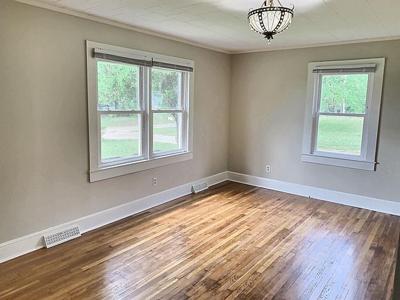 Large living room, lots of natural light.