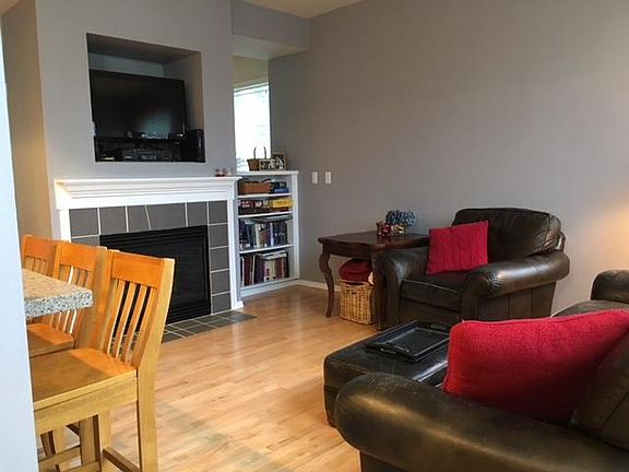 family room, gas fireplace, lots of windows