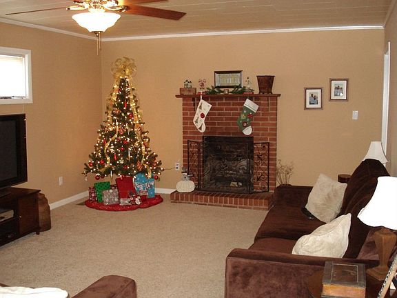 Lovely fireplace and mantle in living room