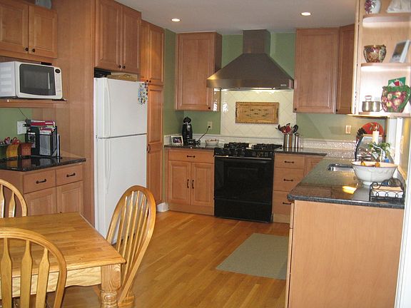 Remodeled eat-in kitchen with granite