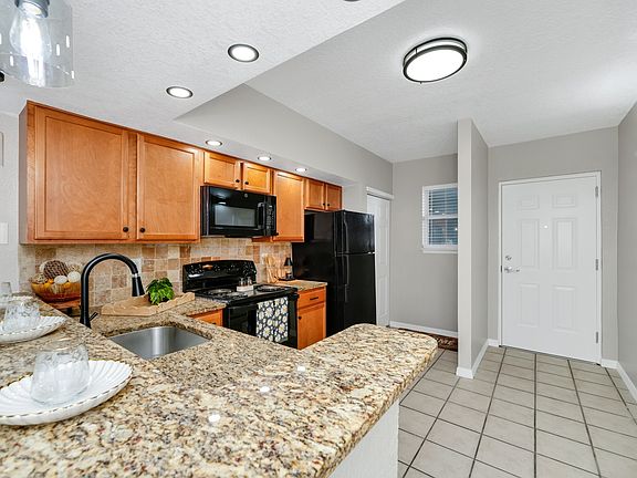 Wonderful kitchen layout with ample counter space.