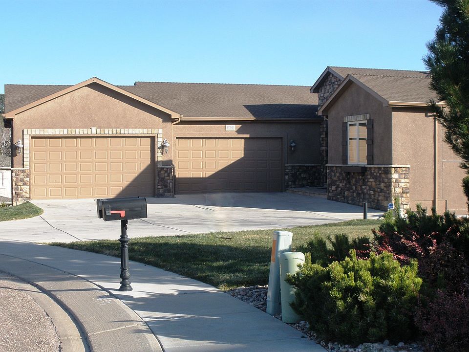 Front view; 4 CAR GARAGE!