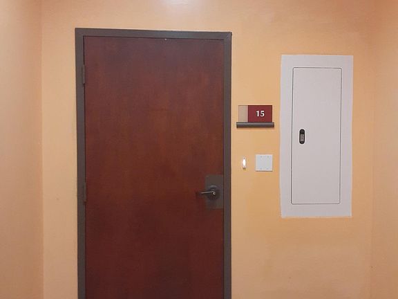 Private entry with door bell. This is a perfect apartment space for a home office!