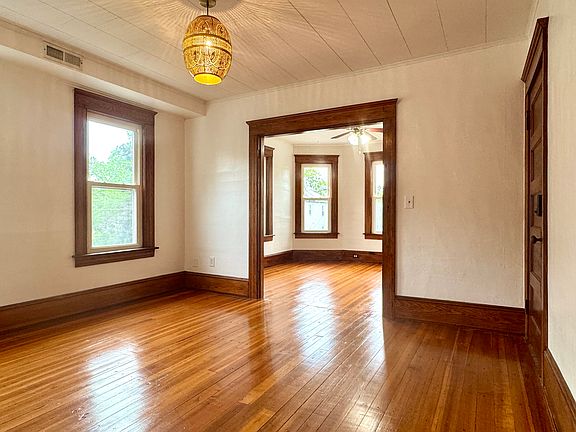 View open concept dining room into living room.