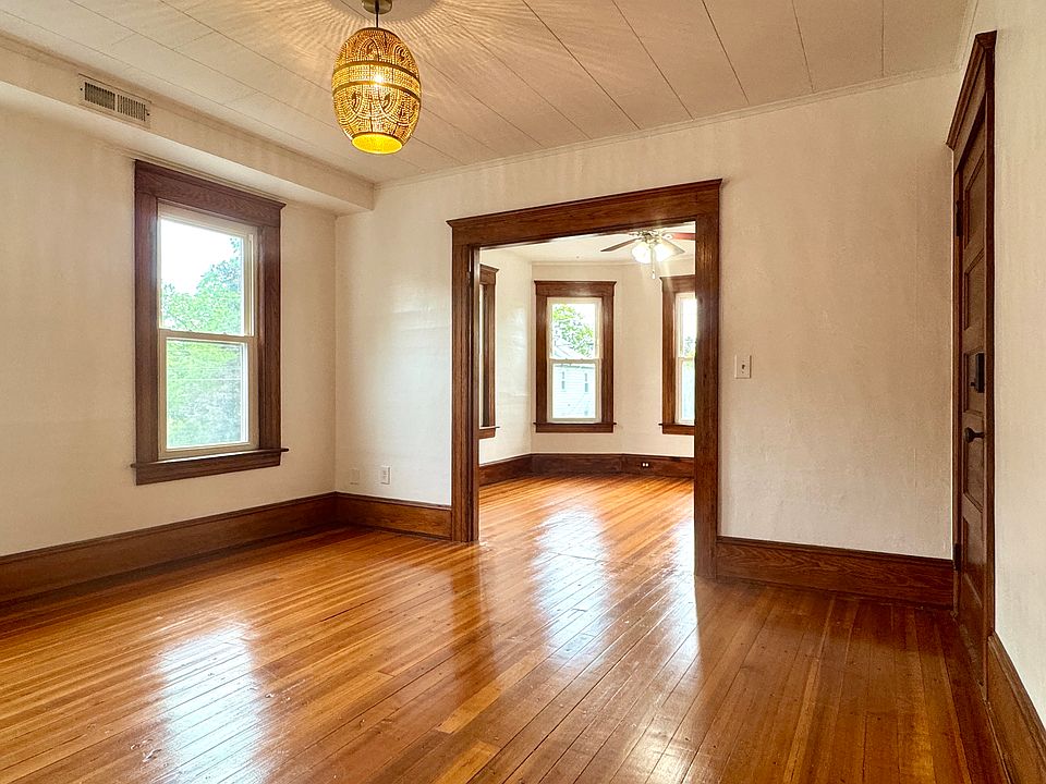 View open concept dining room into living room.
