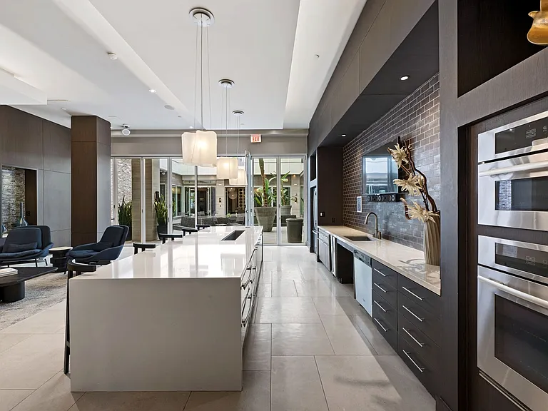 Catering kitchen lounge with bar top seating