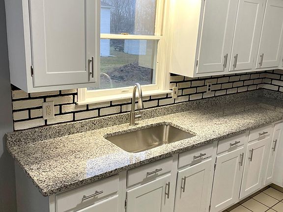 Cabinets galore, brand new stainless sink and faucet