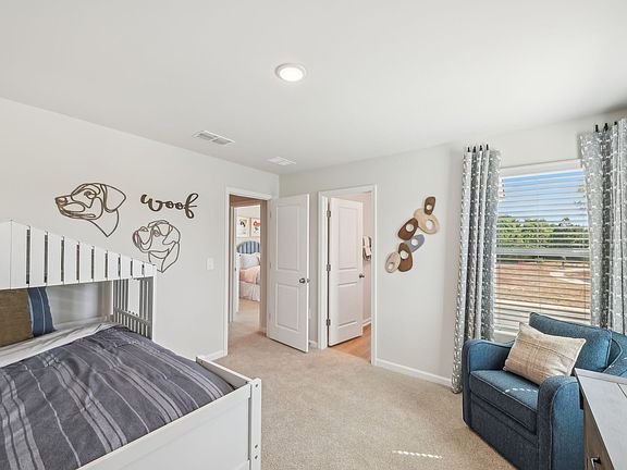 Secondary bedroom in the Jade floorplan at a Meritage Homes community in Mebane, NC.