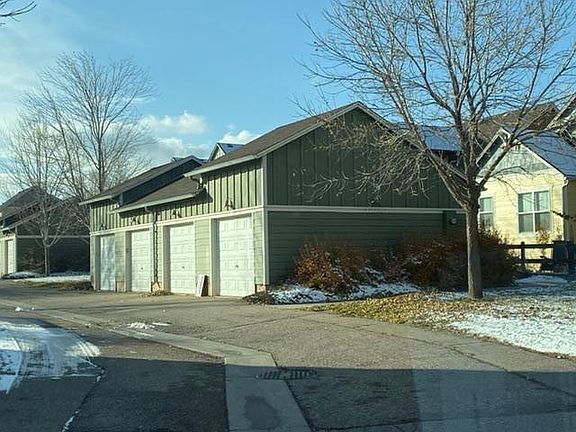 Detached single garage on the end a few yards down back sidewalk
