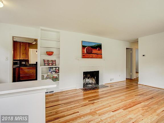 Living Room with wood-burning fireplace