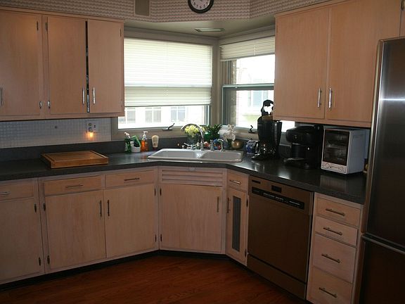 Kitchen - updated cabinets, window over sink