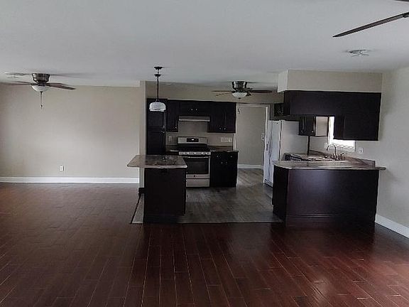 living, dining and kitchen.