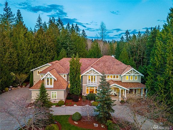 This stunning custom home featuring 6690* sq ft plus a 1640* sq ft state of the art gymnasium; located in the sought after community of Hunters Glen in Redmond (not part of the neighborhood CCR's).  