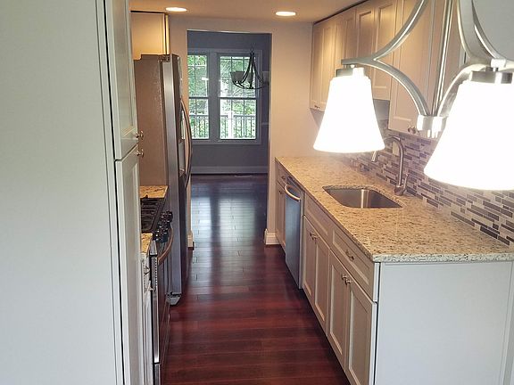 Breakfast nook looking into kitchen & back is dining room.