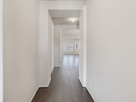 Entryway into the open concept family room and living room