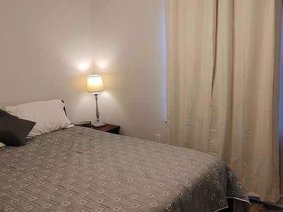 New mattress, topper, linen, curtains Queen platform bed