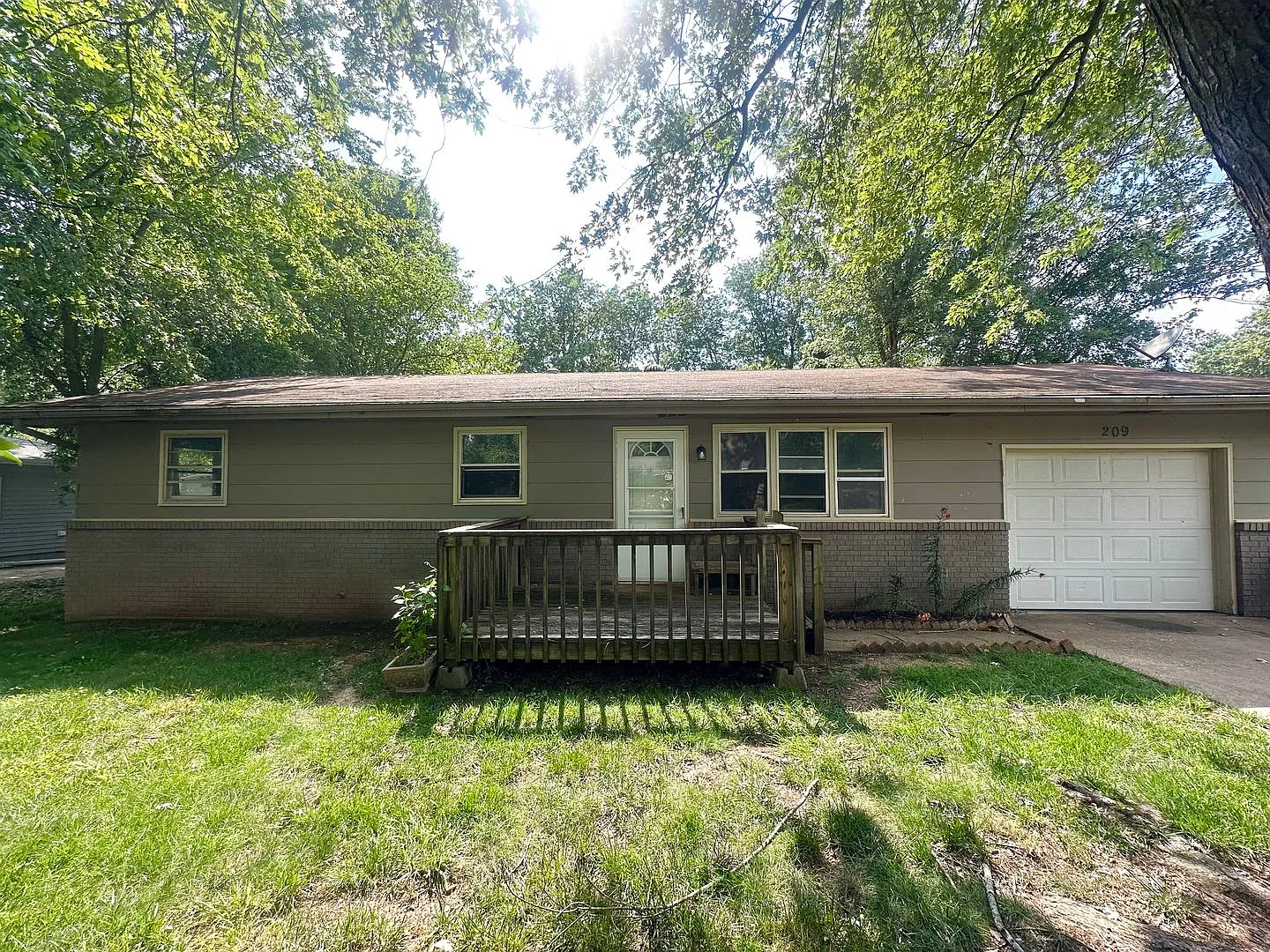 3 Bedroom Home with Garage and Spacious Fenced Yard! — Photo 1