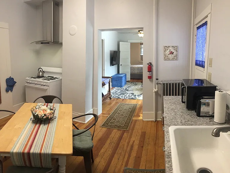 View from the kitchen towards the living room and bedroom