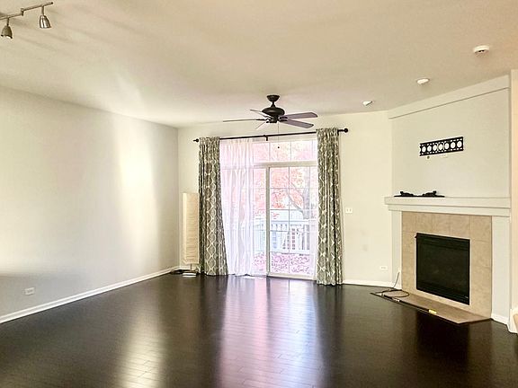 Living Room with Fireplace n track lights
