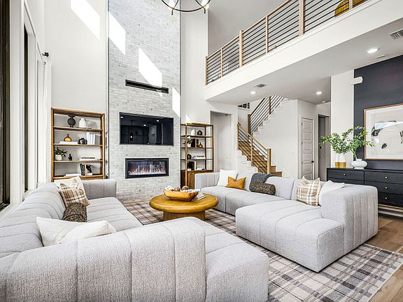 Expansive Gathering Room with Built In Fireplace