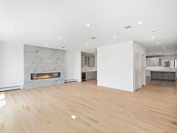 Living Room to Kitchen and Formal Dining Room
