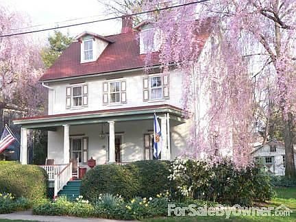 Spring Glory on Linden Street : The weeping cherry trees flanking the porch start the spring show ea