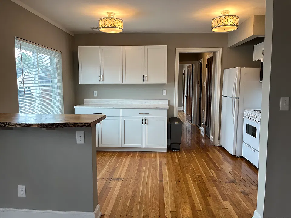 Kitchen, updated cabinets, live edge 4 person bar top
