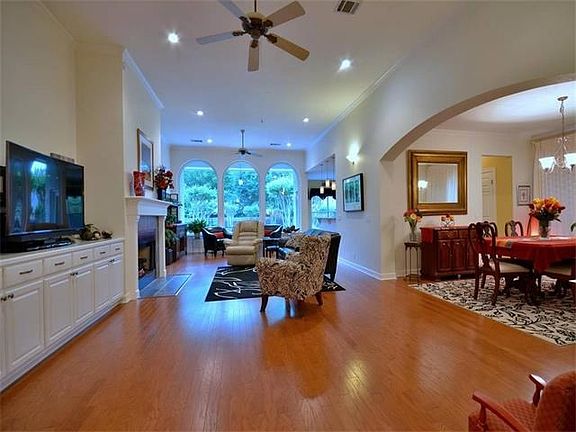 The family room is spacious running from the foyer to the back of the home.