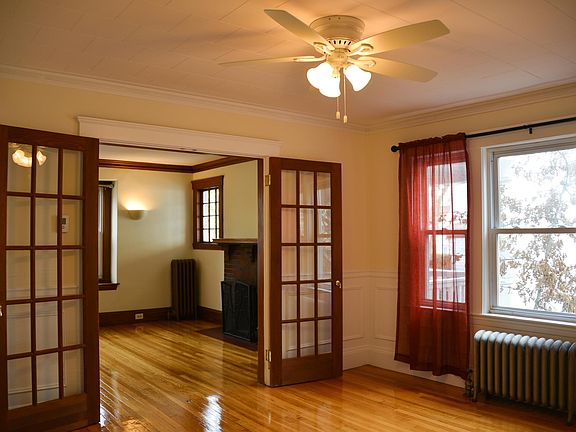 Formal Dining Room w/Wainscoting, French Doors & Ceiling Fan