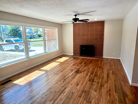 Living room with massive southern facing front window