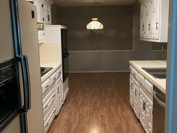 Kitchen and breakfast area beyond