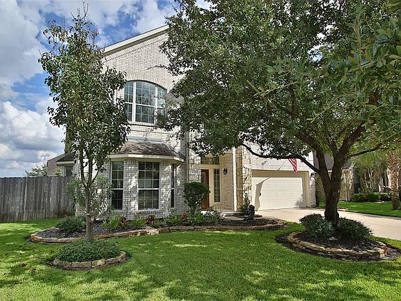 What a beautiful stone & brick home!   Home has wood looking tile on most of the first floor, gorgeous recently updated kitchen, warm an inviting two story family room, spacious formal dining room, and of course, a first floor master suite with an amazing closet with built ins!
