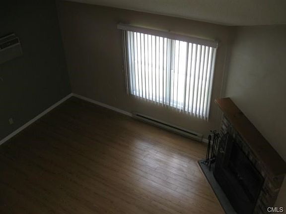 View of Living Rm & fireplace-Gorgeous floors!