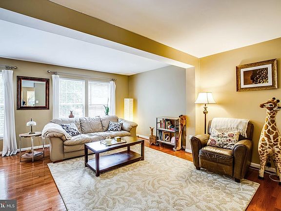 Sun streams in the front windows to Living Room
