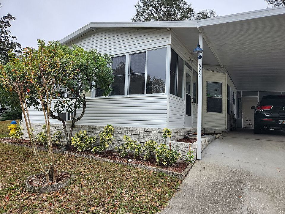 Sunroom and tandem driveway