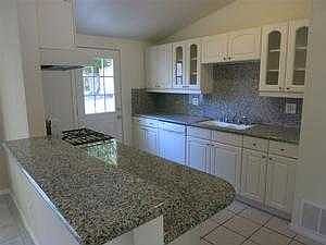 View of Kitchen with Granite Countertops